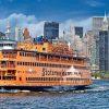 This is a photo of NY Harbor and lower Manhattan. The Staten Island Ferry dominates the foreground