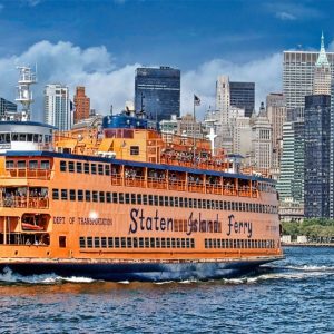This is a photo of NY Harbor and lower Manhattan. The Staten Island Ferry dominates the foreground