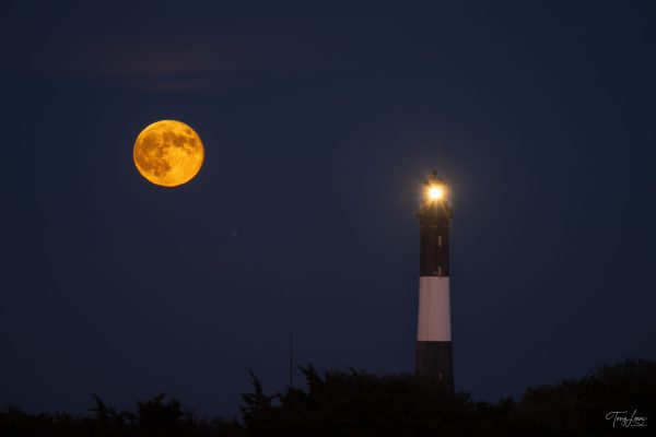 Hunter Super Moon rise behind the Fire Island Lighthouse.