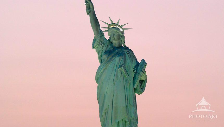 Statue of Liberty with an ombre sky.