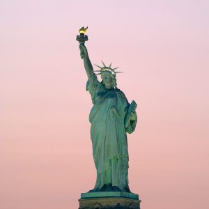 Statue of Liberty with an ombre sky.