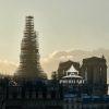 The Spire reappears on the Paris skyline, protected by the construction scaffolding.