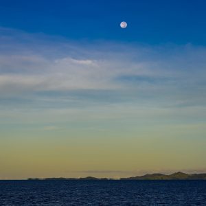 "Moonlit Tranquility Near Yakuilau" presents an enchanting glimpse into the serene beauty of a
