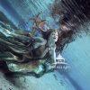 The Serene Queen of Ocean’s Grace transports viewers to a tranquil underwater realm where elegance