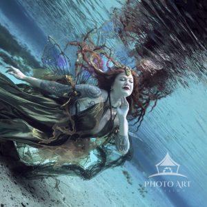 The Serene Queen of Ocean’s Grace transports viewers to a tranquil underwater realm where elegance