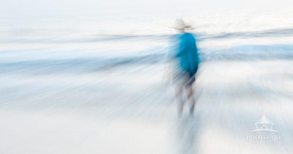 The sunset on that morning was very bland and a colorless sky. This fisherman happened to walk into