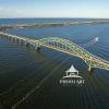 The fishing boat Laura Lee leaves Captree and goes under the Robert Moses bridge to a morning of