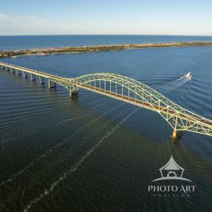 The fishing boat Laura Lee leaves Captree and goes under the Robert Moses bridge to a morning of