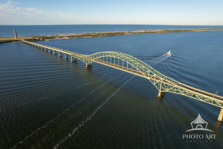The fishing boat Laura Lee leaves Captree and goes under the Robert Moses bridge to a morning of