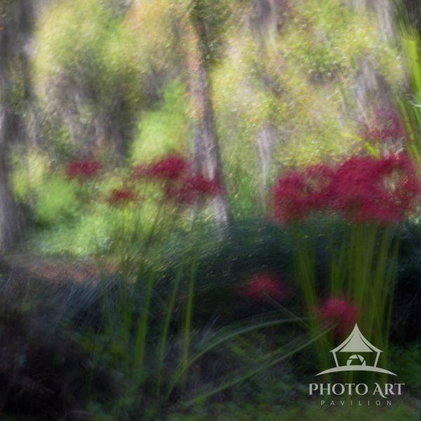 The artwork is a blurred, impressionistic image of a natural scene with vibrant greens, and