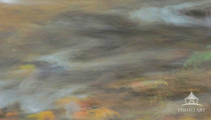 Without the sharp edges of rocks or banks, the image becomes a study of rhythm and movement. The