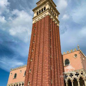 The St. Mark's Campanile is the iconic bell tower of St. Mark's Basilica in Venice. This replica