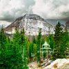 The wind had the scent of ice and pine, a razor-sharp whisper against my cheek. I stood on the rocky