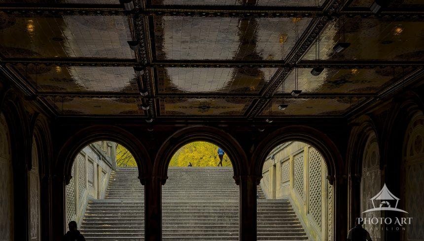 Step into the architectural grandeur of the Bethesda Terrace Arcade in Central Park. This moody,