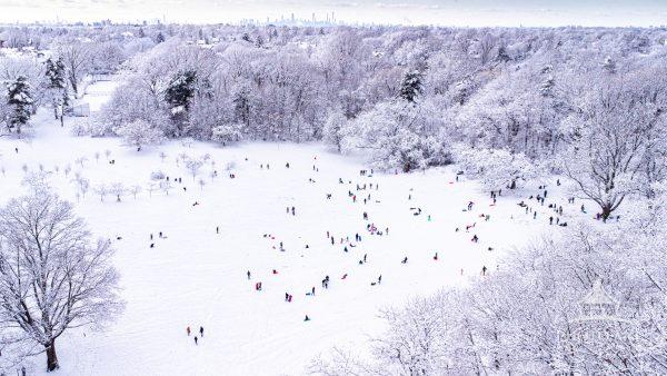 Aerial view of a fun family snow day.