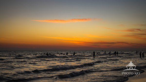 At night, Vero Beach remains an active place where swimmers relish the last rays of sunlight dancing