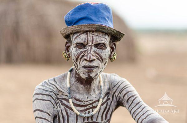Zino, the man with the blue hat, in Duss Village.
Kara tribe, Omo Valley, Ethiopia