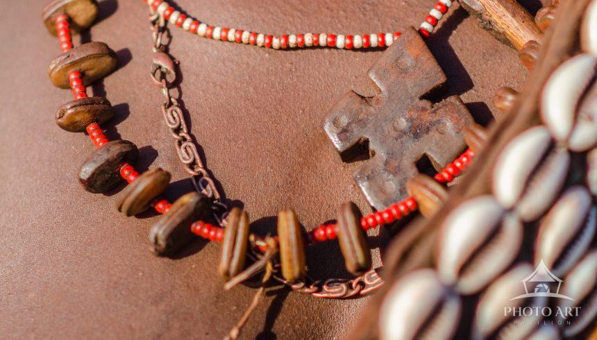 Details of the many necklaces worn but a Hamar women. The jewelry worn identifies the tribe and