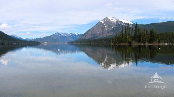 Mountain Reflections - Mountain reflecting off a calm lake. Lake Wenatchee