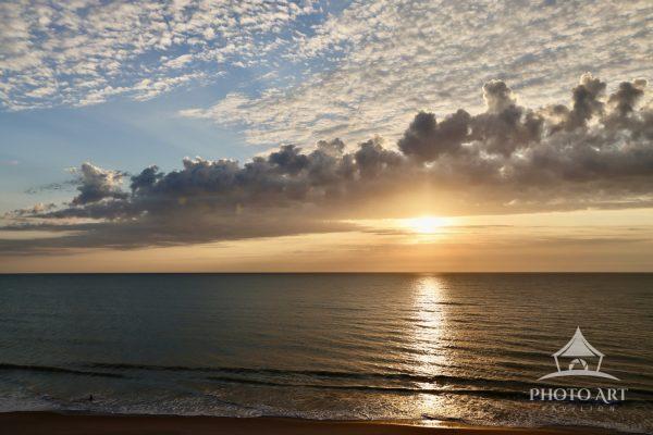 A Florida sunrise welcomes a new day, an invitation to jump in and take an early morning swim.