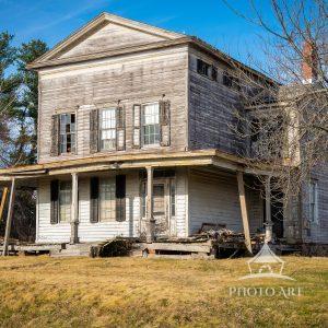This unique Greek Revival Townhouse as Applied to a Farmhouse was built circa 1830, according to an