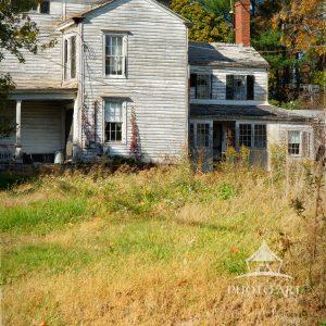 This unique Greek Revival Townhouse as Applied to a Farmhouse was built circa 1830, according to an