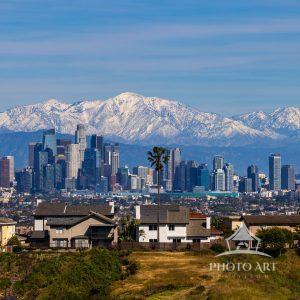 Downtown Los Angeles skyline with snow capped Mt. Baldy in the background
