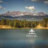 A Quite Colorado lake beneath a dramatic autumn sky. The Rockies at their finest