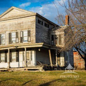This unique Greek Revival Townhouse as Applied to a Farmhouse was built circa 1830, according to an