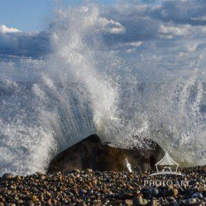 Along the south side of the beach at Montauk point. Walking along the beach, beautiful sky and surf