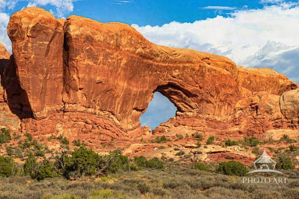 The South Window is roughly 105 feet long and 65 feet high. The hike is a 1-mile round trip.