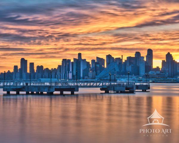 This beautifully timed landscape photograph captures the iconic Midtown Manhattan skyline from