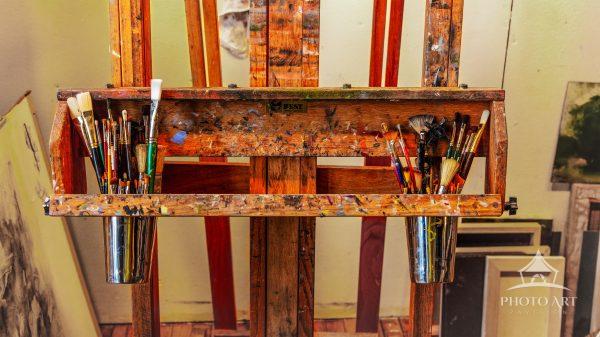 An artist's easel records moments in the creation process for every canvas it ever held. Some marks