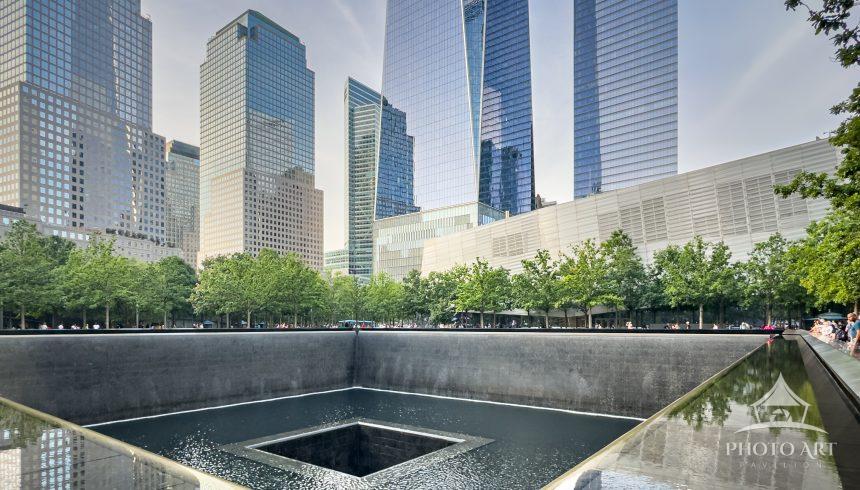 A striking wide-angle view capturing the quiet reverence and modern architecture of the National