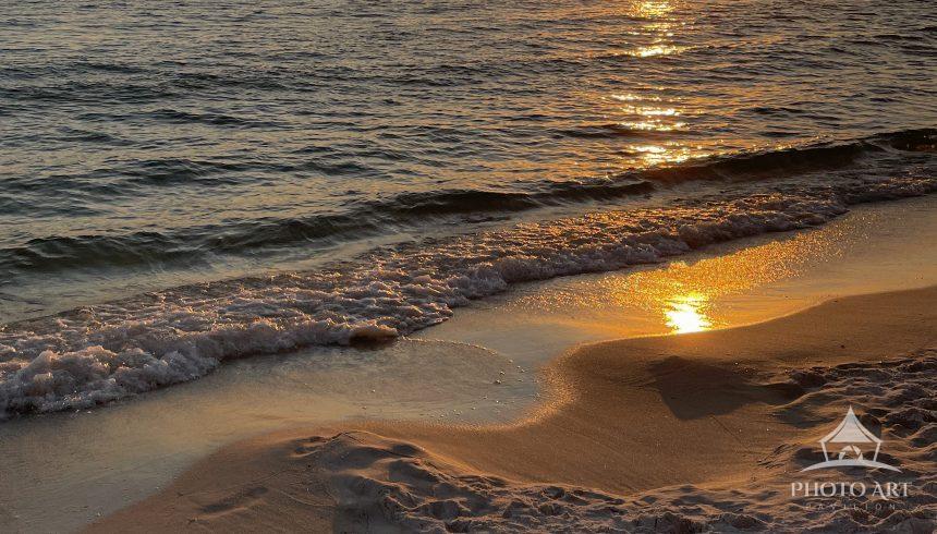 Sunset over the Gulf of Mexico at Panama City Beach, FL.