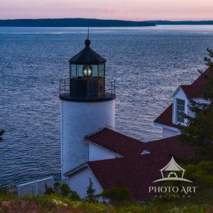 Catching the sunset sky at the Bass Harbor lighthouse Acadia National Park.