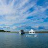 We were on the water in the harbor looking at the land and what a beautiful site. The clouds were so