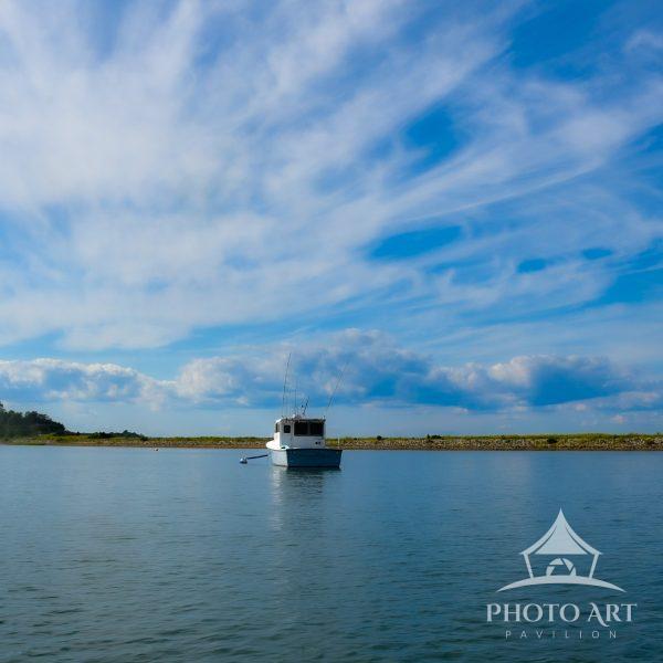 We were on the water in the harbor looking at the land and what a beautiful site. The clouds were so
