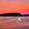 Bar Harbor Sunset captures the quintessential Maine maritime evening, where lobster boats rest upon