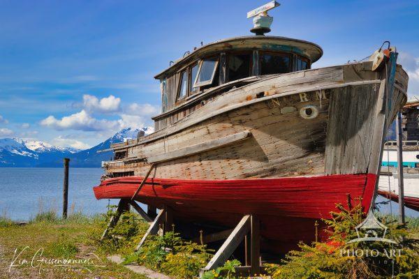Interim captures the weathered dignity of a retired fishing vessel at rest along the shores of Icy